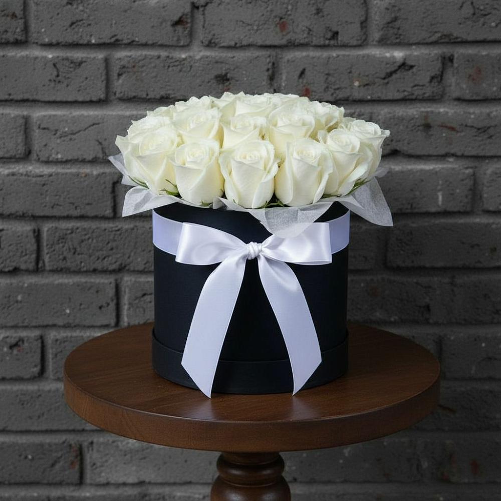 Цветочная композиция из Розы в шляпной коробке в Заклинье